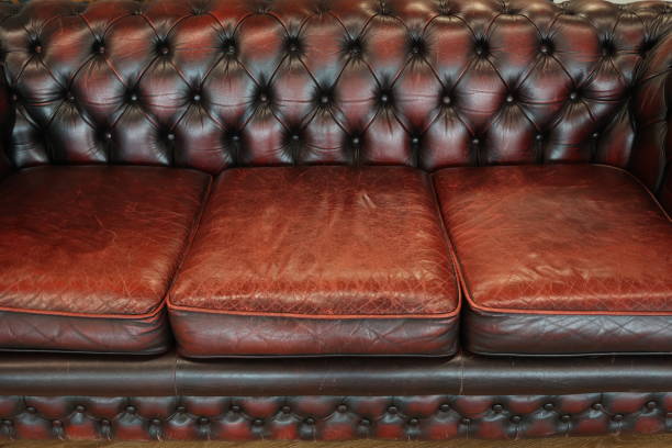 istock Fragment of an old leather sofa 2150151023