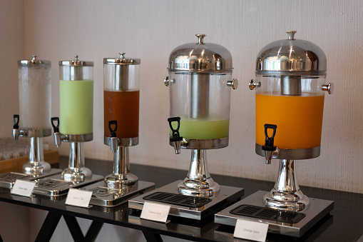 drink juice or beverage dispenser on table