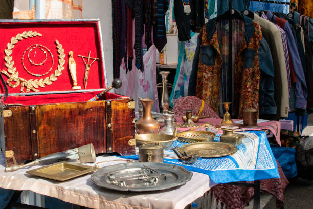 table with antique vintage items at a street fair