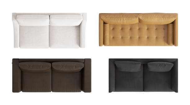 istock Set of four top views of a modern three-seater sofas. An ivory modern classic sofa with shaped armrests, a dark brown leather sofa, an orange sofa with back cushions, a black leather sofa. 2150155017