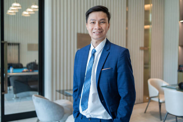 istock Confident Businessman with Tablet in Modern Office 2150162771