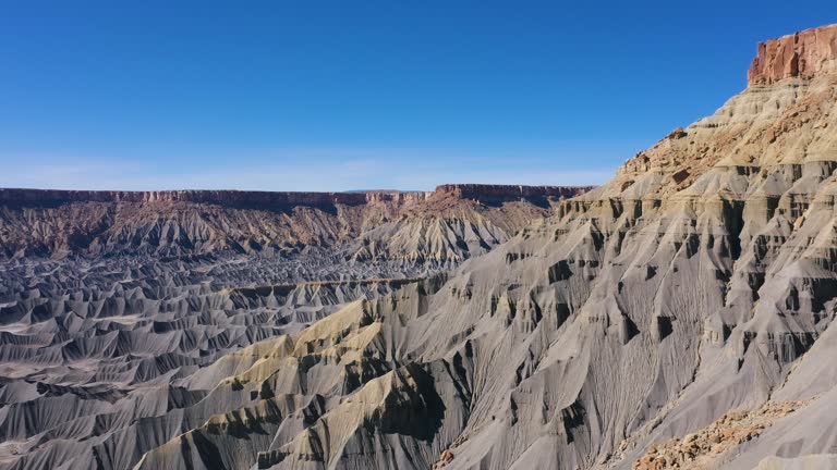 Mountain Range And Gorges Of Many Hills Of Steel Blue Sandstone In Canyon Butte