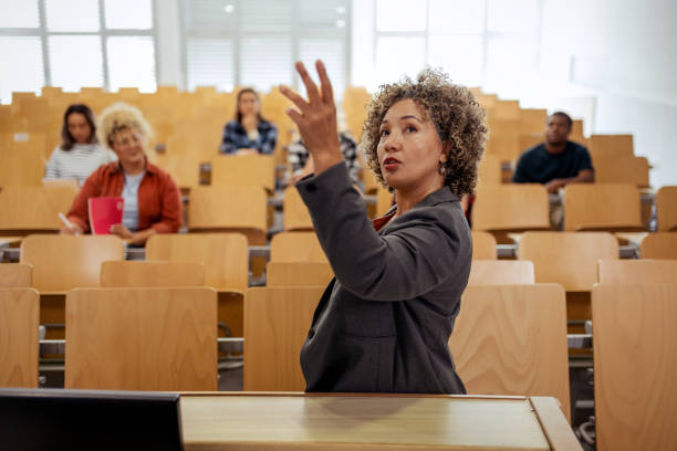 istock Professor Holding Lecture to a Group of University Students 2150163016