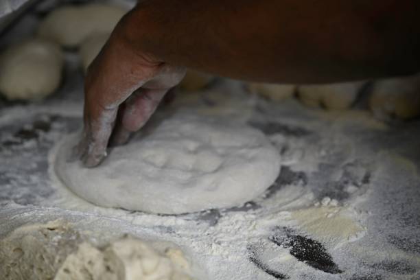 istock Isolated high resolution image close up of pizza preparation process 2150163542