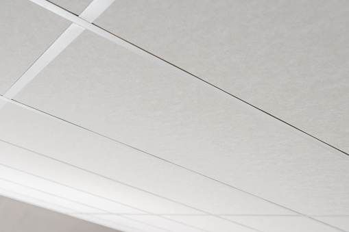 Modern Commercial Suspended Ceiling Close Up Photo. Industrial Theme.