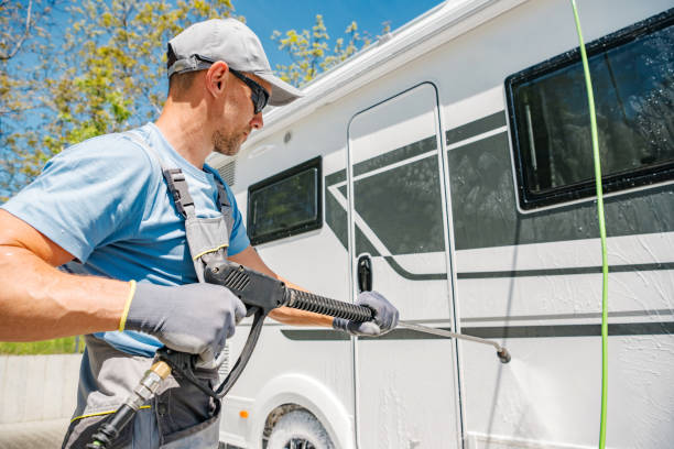 istock RV Rentals Worker Pressure Washing Class C Camper Van 2150168297