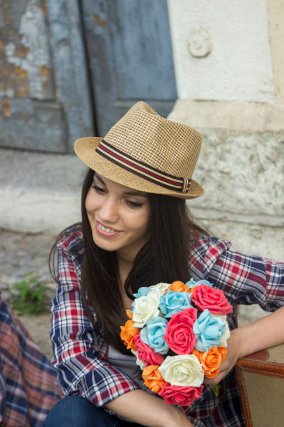 Happy young hipster woman day dreaming