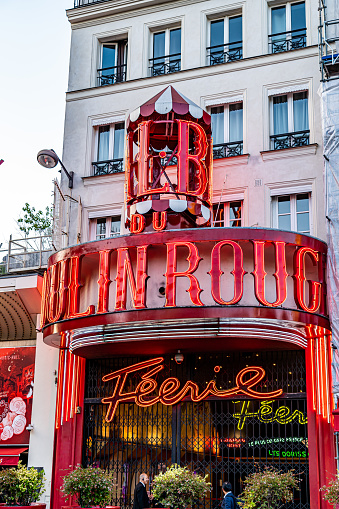 Paris, France. July 6, 2023. Entrance of the mythical and famous cabaret venue Moulin Rouge located on the boulevard Clichy just outside the Montmartre district of Paris.