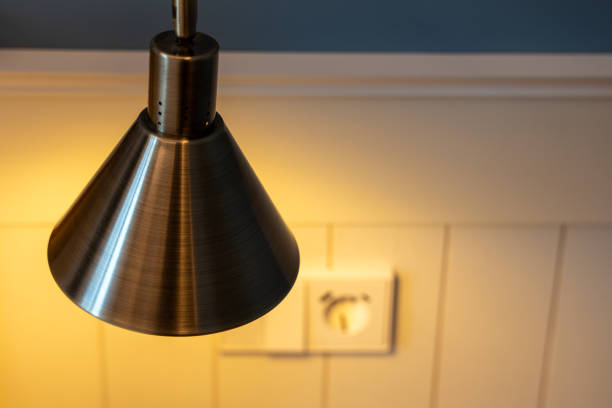 istock Night lamp by the hotel bed. 2150172811