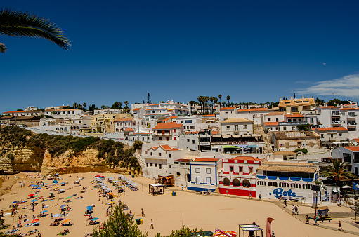 Beautiful town of Carvoeiro with its house and beach, tourist and vacation, Algarve, Portugal. June 30, 2022.
