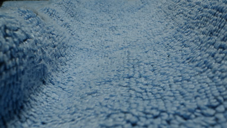 Blue wool textile cloth texture close-up macro. Woolen background. Fashion fabric multicolor. Sheep wool for clothes.Carpet