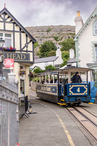 Llandudno, Wales - July 2, 2023 : A tram heading towards the summit on the Great Orme Tramway from Victoria Station
