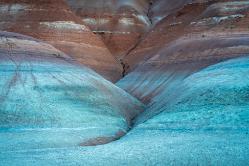 Colorful layered desert hills and badlands in southern Utah.