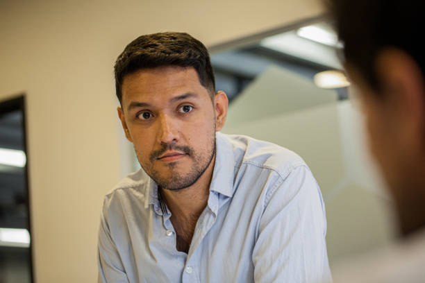 istock Real estate agent listening to client's comments during meeting 2150185401