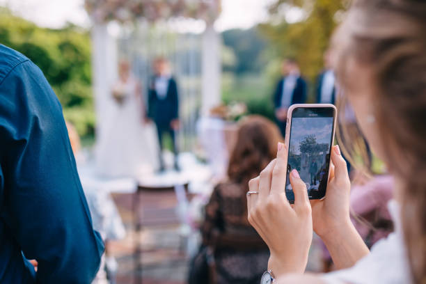 istock take photo of wedding ceremony 2150187758