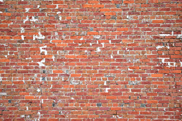 istock Crumbling vintage red brick wall old restaurant vibe 2150192090