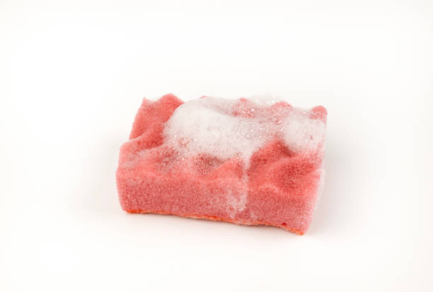 istock A sponge with soap suds isolated on a white background. 2150193809