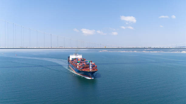 istock Aerial view of giant cargo container ship in transit. Front view of cargo container ship in transit in Izmit Gulf. 2150194378