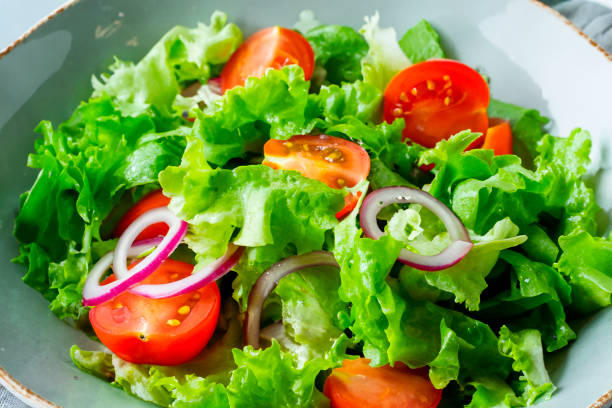 istock Bowl of Salad on White plate 2150196184