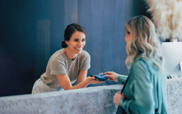 Friendly Business Meeting Between Two Women at Modern Office