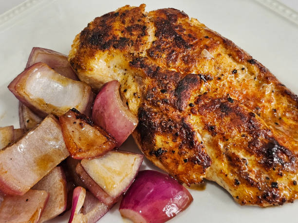 istock Fried chicken breast fillet with red onion 2150200640