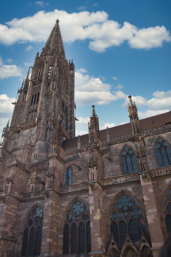 Freiburg, Germany: August, 18 2023: Façade of Freiburg Cathedral in Germany, capital of the Black Forest.
