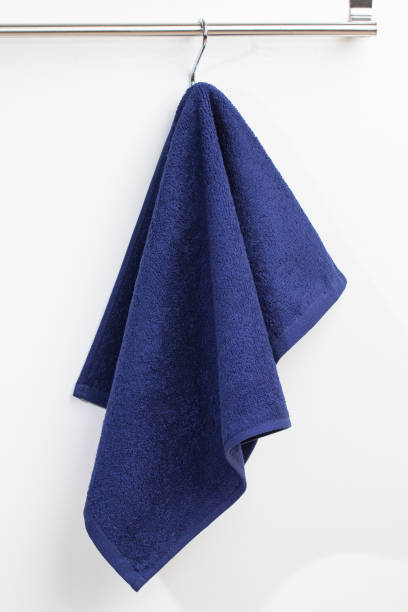 istock a terry towel hangs on a metal bracket attached to the wall 2150205513