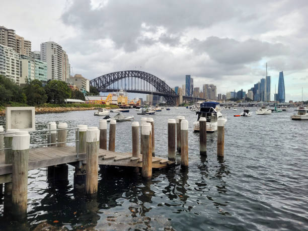 istock Sydney harbour bridge and foreshore on a cloudy overcast day 2150205980