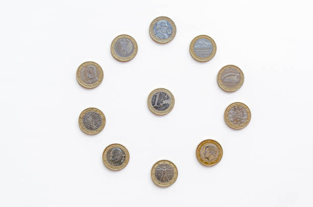 istock One euro coins on white background 2150206353