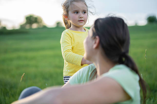 istock Family Day. Mom & Kid in Nature in Spring. 2150214895
