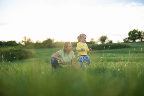 istock Family Day. Mom & Kid in Nature in Spring. 2150214897