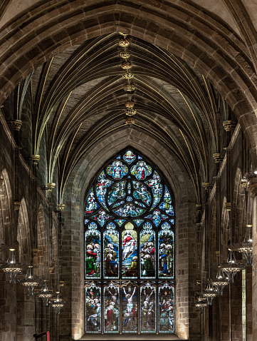 Edinburgh, Scotland - Jan 18, 2024 - Beautiful Glass stained window inside of The thistle chapel in St Giles' Cathedral or the High Kirk. The most important place of worship in the Edinburgh, Space for text, Selective focus.