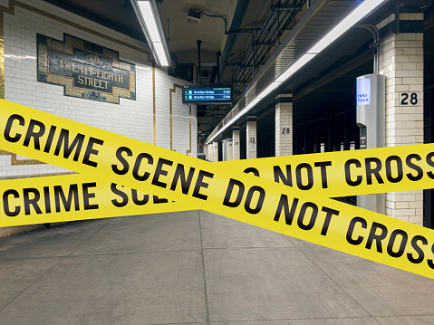 Crime scene warning tapes inside a subway station