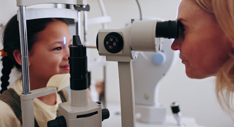 Optometrist, kid and eye test for eyeglasses, vision and smile for eyecare and glasses. Medicare, medical and senior doctor for eyesight, optometry office for a visual exam and prescription eyewear