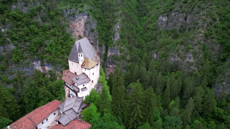 Sanctuary of Saint Romedio - famous piligrimage site and monastery of Europe. Trentino , val di Non, north of Italy. aerial drone view