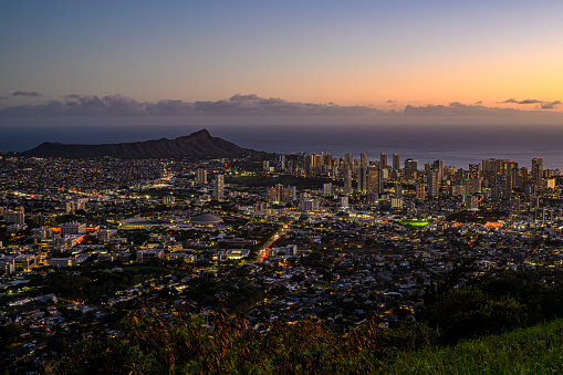 View from the Tantalus Lookout to the skyline of Honolulu and Diamond Head after sunset - Oahu, Hawaii