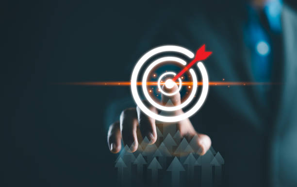istock Business objective, Strategic planning for business growth and target customer group.Businessman touch target icon with up arrow on virtual screen. Targeting business concept. 2150223725