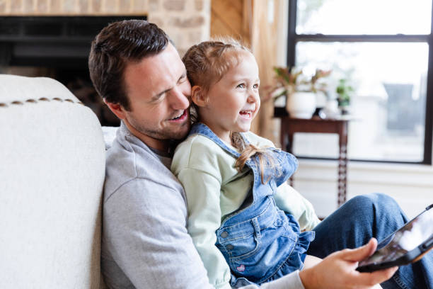 istock Father checks his emails on the digital tablet 2150223853