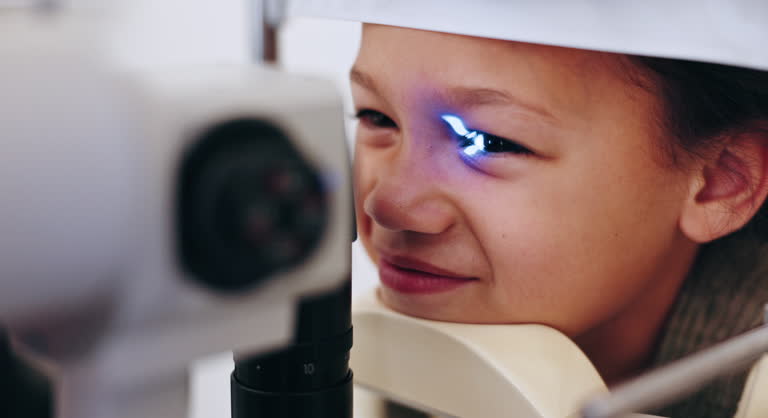 Healthcare, ophthalmoloscope and child for vision for eye test in optometrist office for glasses, lens or spectacles. Face, little girl and kid with consult for correction, myopia or glaucoma by exam