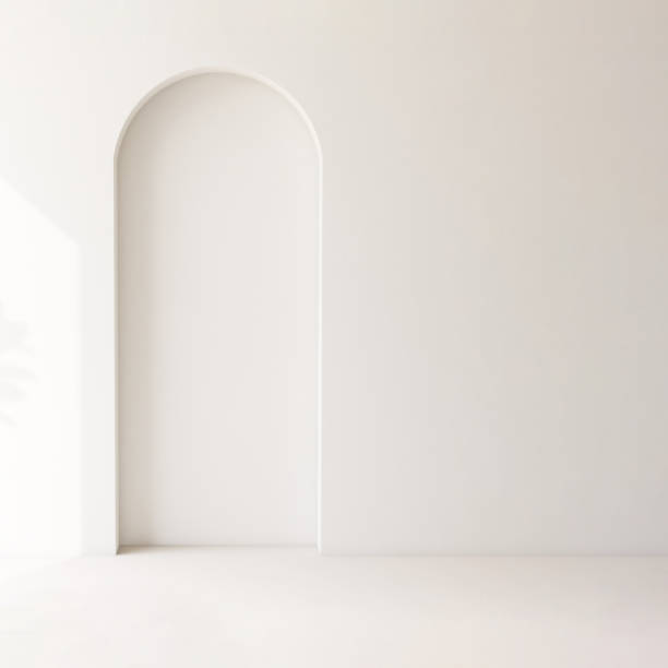istock Blank white wall with debossed arch architecture in sunlight with shadow 2150225961