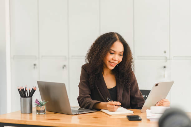 istock Young African American professional woman using a tablet at work. 2150226685