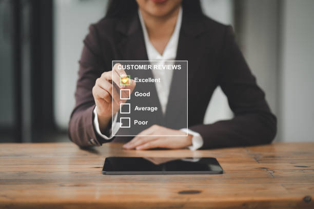 istock Users rate their service experience in an online application for a customer satisfaction feedback survey. Customer review good rating concept 2150230390
