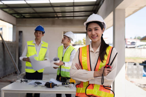 istock Happy of team construction worker. engineer, construction site and team outdoor for building project 2150233066