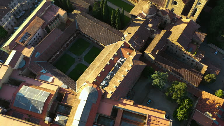 Drone rotating over the Basilica di Santa Maria Novella, in sunny Florence, Italy