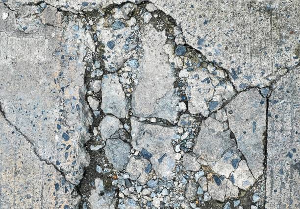 White concrete wall with crack.