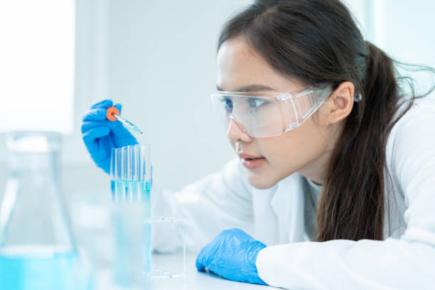 istock Scientist analyze biochemical sample in advanced scientific laboratory. Medical professional check chemical mix microbiological developmental of viral. Biotechnology research in science lab. cosmetic 2150237982
