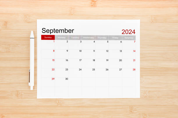 istock September 2024 calendar page on wooden background. 2150238785