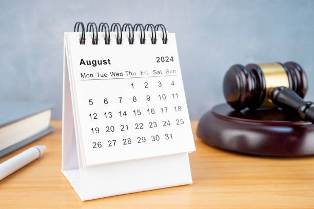 istock Desk calendar for August 2024 and judge's gavel. 2150238804