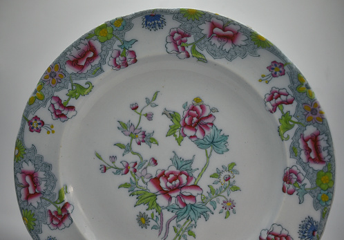 antique collectable porcelain plate with floral decoration