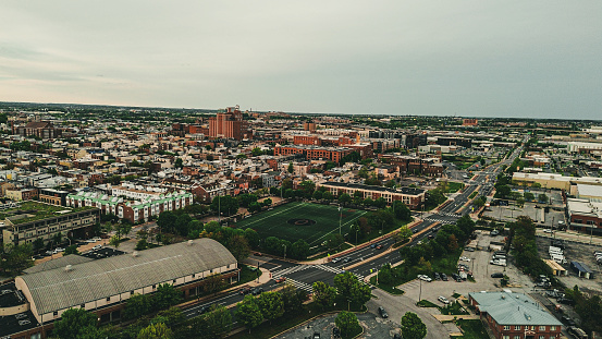 Aerial drone view of Baltimore city during sunset